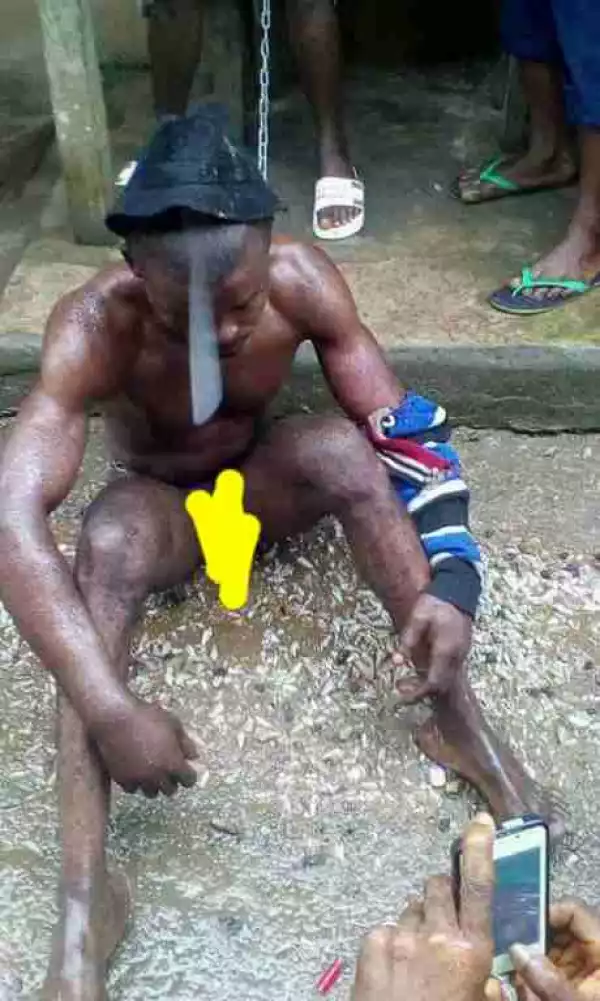 Man Caught Stealing Transformer Cables In Akwa Ibom Stripped Unclad By Vigilante (Photos)